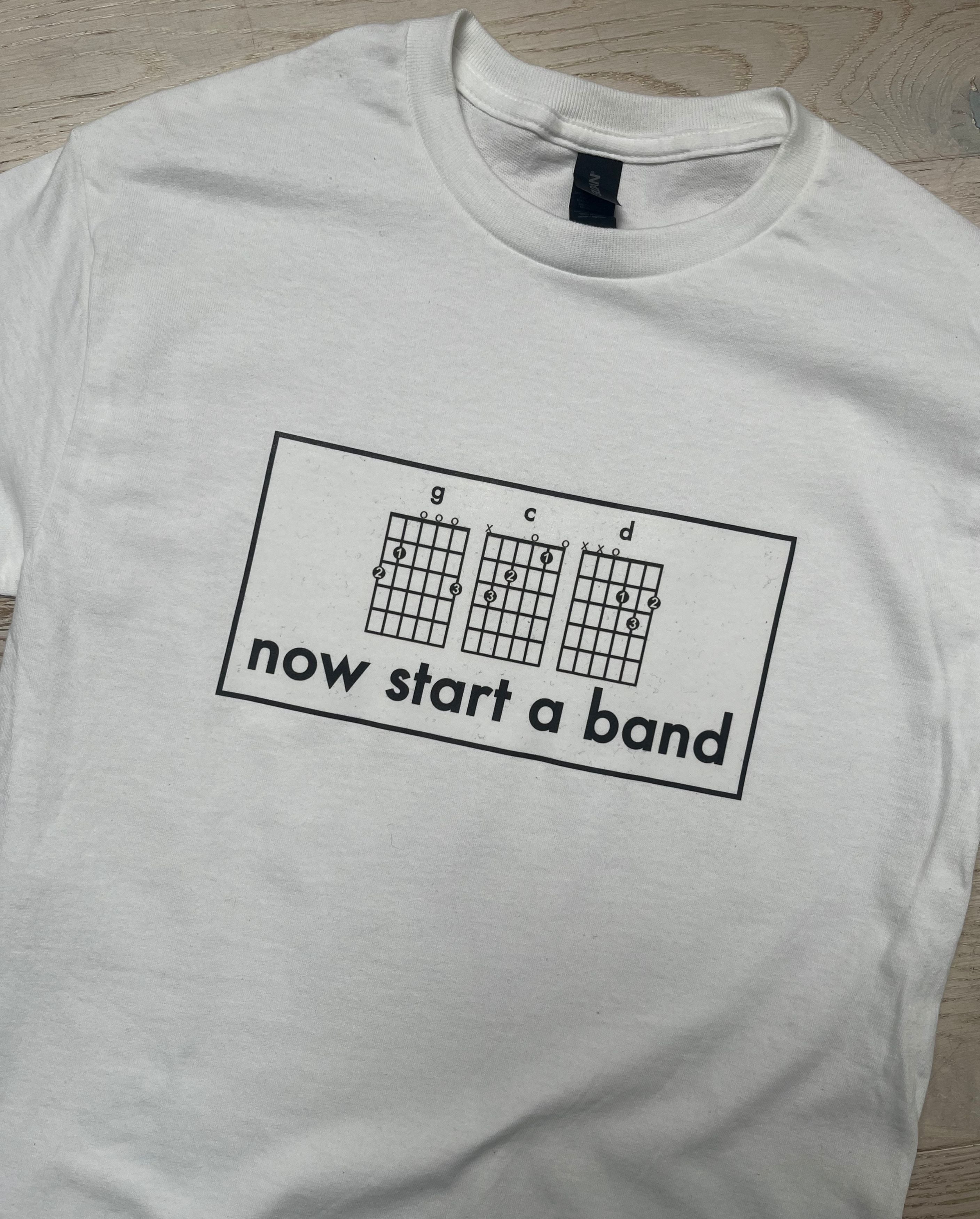 Pop culture punk indie band slogan t-shirt from Pop Vulture