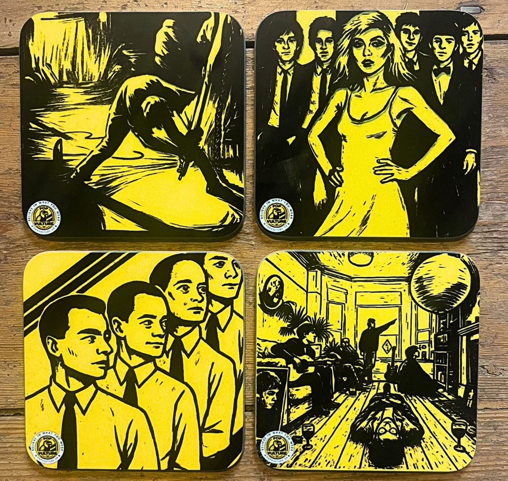 Set of four music album cover coasters – The Clash, Blondie, Kraftwerk, Oasis
