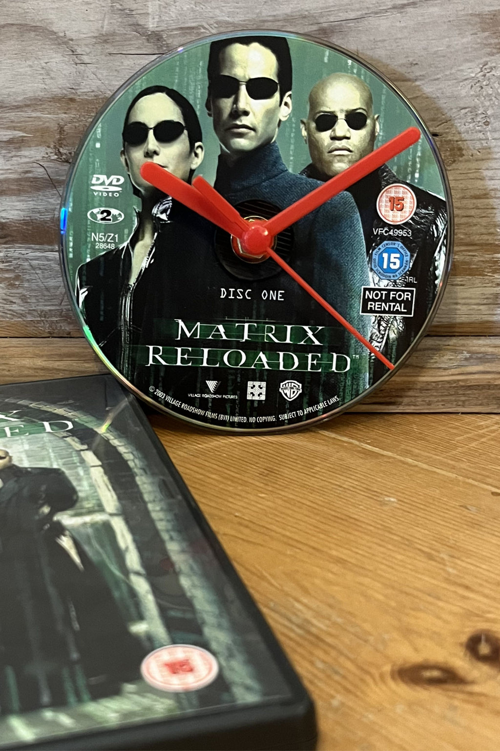 Matrix Reloaded wall clock with green code rain design by Pop Vulture